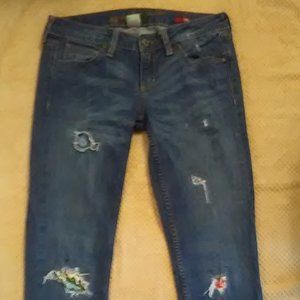 Patched ankle skinny jeans